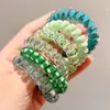 Elástico de cabelo tipo cordão de celular dopamina estilo coreano para meninas, corda de cabelo simples e que não danifica com um design único, elástico de cabelo