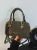 Bolsa de Mão Estilo de Rua Bolsa Boston 2025 Novo Estilo Fashionável Compacta Texturizada Moda Transversal de Ombro para Mulheres