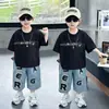 Conjunto de Verano para Niños 2026 Estilo Nuevo Conjunto de Camiseta de Manga Corta para Niños, Elegante y Genial Versión Coreana de Pantalones Cortos de Mezclilla para Niños Conjunto de Dos Piezas T