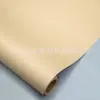 Fábrica de Wuxi suministra rollo de papel Kraft recubierto cinco en uno papel Kraft de liberación embalaje plano dividido