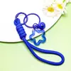 Llavero Acrílico de Estrella de Cinco Puntas con Cordón Color Caramelo Encanto para Estuche de Auriculares Decoración Fresca para Empaque de Bolsas de Pareja
