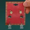 Pendientes de aleación con diseño de alce y copo de nieve, de estilo europeo y americano, con dibujos creativos, para Navidad.