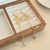 Aretes Largos de Lazo Micro-incrustado Estilo Coreano de Alta Gama Luz Cálida y Suave Lujo Elegante Dulce Nicho Distintivo Aretes de Mujer