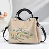 Nova bolsa de mão elegante e versátil para o dia a dia com bordado em estilo chinês, color blocking retrô, adequada para o trajeto diário das mulheres