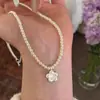 Collar de Perla Natural Coreana Dongdaemun con Cuentas de Concha Versátil Flor Cepillada de Nicho Cadena para Clavícula de Mujer Tendencia de Gama Alta