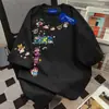 Camiseta de Marca de Moda para Mujer con Estampado de Dibujos Animados Europeos y Americanos, Cuello Redondo, Manga Corta, Estilo Casual Holgado para Pareja, Verano 2025