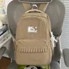 Mochila dulce con volantes de encaje, estilo suave, para estudiantes de secundaria y preparatoria, ofreciendo un look claro y fresco para la escuela y salidas