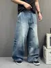 Silueta urbana casual, efecto de bigote lavado, jeans de corte curvo holgados, nuevos pantalones anchos relajados estilo americano para hombre y mujer