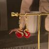 2025 Nuevos Aretes de Perlas de Serpiente Roja para Mujer Aretes Únicos de Estilo Caliente de Alta Gama Diseño de Nicho Aretes de Año Nuevo