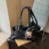 Bolso vintage de cuero encerado para mujer, gran capacidad, nuevo 2026 otoño e invierno casual de nicho, bolso de hombro o axila, bolso para el trabajo