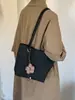 Bolsa casual estilosa de grande capacidade 2026 novo modelo bolsa de ombro casual bolsa de axila padrão trançado bolsa sacola para o dia a dia