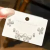 Elegante conjunto de tres pendientes de mariposa de microcircón estilo francés de Corea del Sur para mujer, exquisitos pendientes pequeños combinables con todo, aguja de plata s925 para mujer.