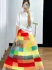 Traje de diseño de dos piezas Miyake Verano 2024 para mujer, top de manga corta murciélago con cuello redondo Elapor, falda de bloques de color arcoíris