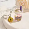 Llavero de arena movediza para taza de té con leche, colgante acrílico de gato de la suerte creativo para bolsos de niñas y llaveros de coche, regalo pequeño