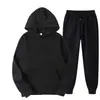 Conjunto de sudadera de color liso de talla grande para hombre y mujer, 220 g de tela, fabricante mayorista, conjunto holgado de talla grande de marca de moda para parejas