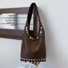 Bolso Cruzado Retro Casual para Hombro Moda Europea y Americana Primavera 2026 Simple y Elegante Gran Capacidad Bolso Cubo de Moda