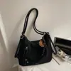 Bolsa Retro de Grande Capacidade para o Dia a Dia de Mulheres 2025 Inverno Nova Bolsa de Ombro Transversal Casual Mochila Multiuso