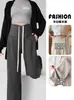 Pantalones de maternidad estilo primavera y otoño se pueden usar afuera después del parto invierno con felpa adicional sueltos casuales con cordón pierna recta pierna ancha pantalón largo de arroz glutinoso