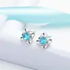 Nuevos pendientes de botón de trébol de diamante azul estilo coreano para mujer, personalidad dulce, incrustados con diamante, circonita, pendientes de botón de trébol de cristal azul, joyería