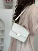 Elegante y estilosa bolsa de axila para mujer de piel genuina, modelo nuevo, bolsa de tofu a la moda y versátil para el trabajo, bolso de hombro y cruzado