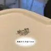Colgante copo de nieve cruz azul clavo de cartílago oreja clavo de titanio pendientes dobles apilados en forma de U pendientes para mujer venta al por mayor