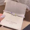 Pulsera de perlas con lazo de doble capa estilo vintage francés, diseño único y versátil, joyería de lujo ligero y de alta gama
