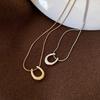Acero de titanio, resistente al color, colgante simple en forma de U de herradura, collar para suéter, joyería para mujer, versátil, clavícula de acero inoxidable de alta gama.