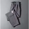 Calça Casual de Seda Gelada Fina de Linho Nova de Verão para Homens, Perna Reta com Etiqueta, Estilo Coreano, Caimento Solto, Tamanho Grande, Calça Esportiva Cropped