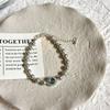 Pulsera de Perlas de Cristal de Aguamarina Cristalina de Alta Calidad con Fuerte Brillo, Lujo Ligero de Nicho Elegante y Exquisito de Gama Alta para Mujeres