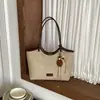 Bolso tote para mujer, nueva colección otoño/invierno 2026, elegante y versátil, con un toque de alta gama, gran capacidad, adecuado para ir al trabajo y diseñado como bolso de axila o bolso de hombro