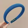 Faixa de cabeça larga de tricô minimalista e elegante estilo coreano para mulheres, novo modelo 2026, adequada para uso diário, projetada para realçar a aparência da linha do cabelo e pode ser usada como faixa de cabeça para lavar o rosto ou presilha de cabelo