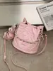 Bolso de mujer de moda 2026 nuevo modelo versátil estilo Chanel con cadena bolso de cubo acolchado para mujer bolso cruzado casual