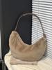 2025 Nuevo Otoño e Invierno Bolso Cruzado Casual Japonés y Coreano Color Caramelo Moda Bolso Dumpling Textura Imitación Minka Bolso de Axila