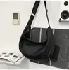 Bolso bandolera de comercio exterior para mujer, adecuado para ir al trabajo, uso casual y estudiantes; bolsa para dumplings de color liso con gran capacidad, versátil y elegante, perfecta para parejas