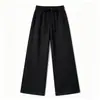 Nuevos pantalones rectos versátiles de otoño en stock para hombre, pantalones casuales deportivos holgados de moda para exteriores a rayas estilo americano