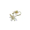 Pendientes de esmalte de goteo lujosos y sofisticados con flores tachonadas de diamantes, diseño único, modernos y versátiles, pendientes suaves y elegantes