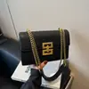 Nuevo bolso de mano vintage de moda europeo y americano para mujer, bolso de hombro, bolso cruzado creativo, bolso cuadrado pequeño de cadena moderno para mujer