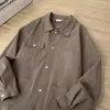 Chaqueta de color liso simple con diseño multibolsillos para hombre, moderna y a la moda, versátil para ir al trabajo y para uso casual, con cuello de solapa y estilo cárdigan.