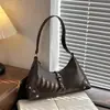 Bolso de Hombro Tipo Dumpling de Alta Gama Transfronterizo para Mujer 2026 Nuevo Estilo Coreano Retro Bolso de Mano para el Trabajo Bolso de Hombro Cruzado