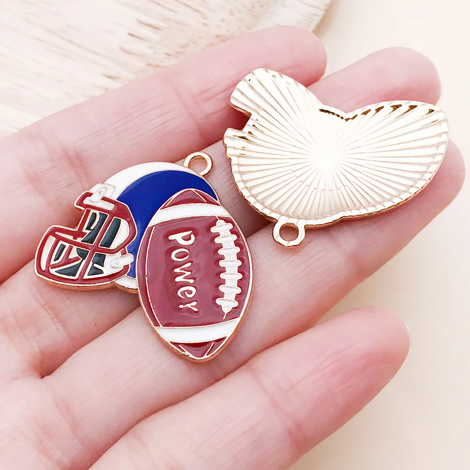 25760-XD-棕色滴油锌合金运动橄榄球头盔26x30mm