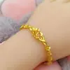 Pulseira de Flor Dourada Estilo Igual TikTok Kuaishou Live para Mulheres, Design Versátil de Temperamento de Luxo Leve Joias de Celebridade da Internet Atacado