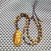 Colgante de cabeza de Guanyin con piedra variable de madera de cristal natural para hombre y mujer, collar con colgante de piedra de ojo de tigre, piedra variable de madera, venta al por mayor, Buda, cabeza de Buda