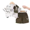 Conjunto de Verano para Niños 2026 Nuevo Elegante Camisa Estampada con Letras de Manga Corta y Pantalones Cortos Conjunto de Dos Piezas para Niños Pequeños y Niños
