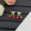 2025 Nuevo Modelo Huajia Versión de Alta Gama Pendientes en Forma de V con Diamantes Rojos Cereza para Mujer, Collar de Lazo de Lujo al por Mayor