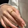 Anel Susu Anel Mobius Design de Nicho Feminino Moda de Alta Qualidade Requintado Versátil Anel Aberto Dourado Joia
