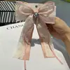 Nuevo Pasador de Pelo Estilo Chino con Perlas y Pedrería en Forma de Corazón, Flor de Pelo de Moda con Moño, Pinza de Resorte con Borla Larga para Accesorios de Cabello de Mujer