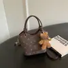Cross2026 Otoño Invierno Nuevo Estilo Coreano Estilo Perezoso Bolso Cubo Bolso de Mano Corazón Elegante Moda Bolso de Hombro Cruzado Individual