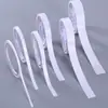 Cinta adhesiva de doble cara al por mayor con alta viscosidad, cinta de mano delgada, coplas del Festival de Primavera, esponja de doble cara, transparente, fácil de dejar marcas, cinta para fijación en pared