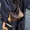 Bolso Retro para Mujer Bolso de Mano Colgante Nicho Viaje Diario Bolso de Hombro Simple Debajo del Brazo Moda Otoño Invierno 2026 Nuevo Versátil