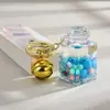 Garrafa de areia movediça de celebridade da internet criativa com contas coloridas em um pingente de garrafa de óleo acrílico chaveiro pingente bolsa pequenos acessórios atacado